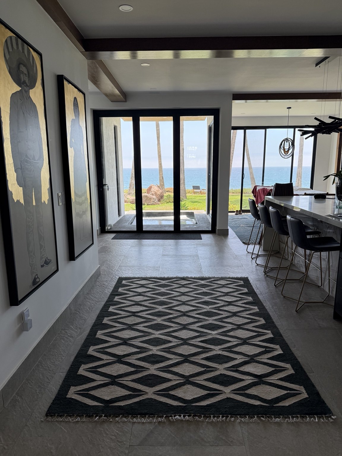 Entry hallway opening to ocean view