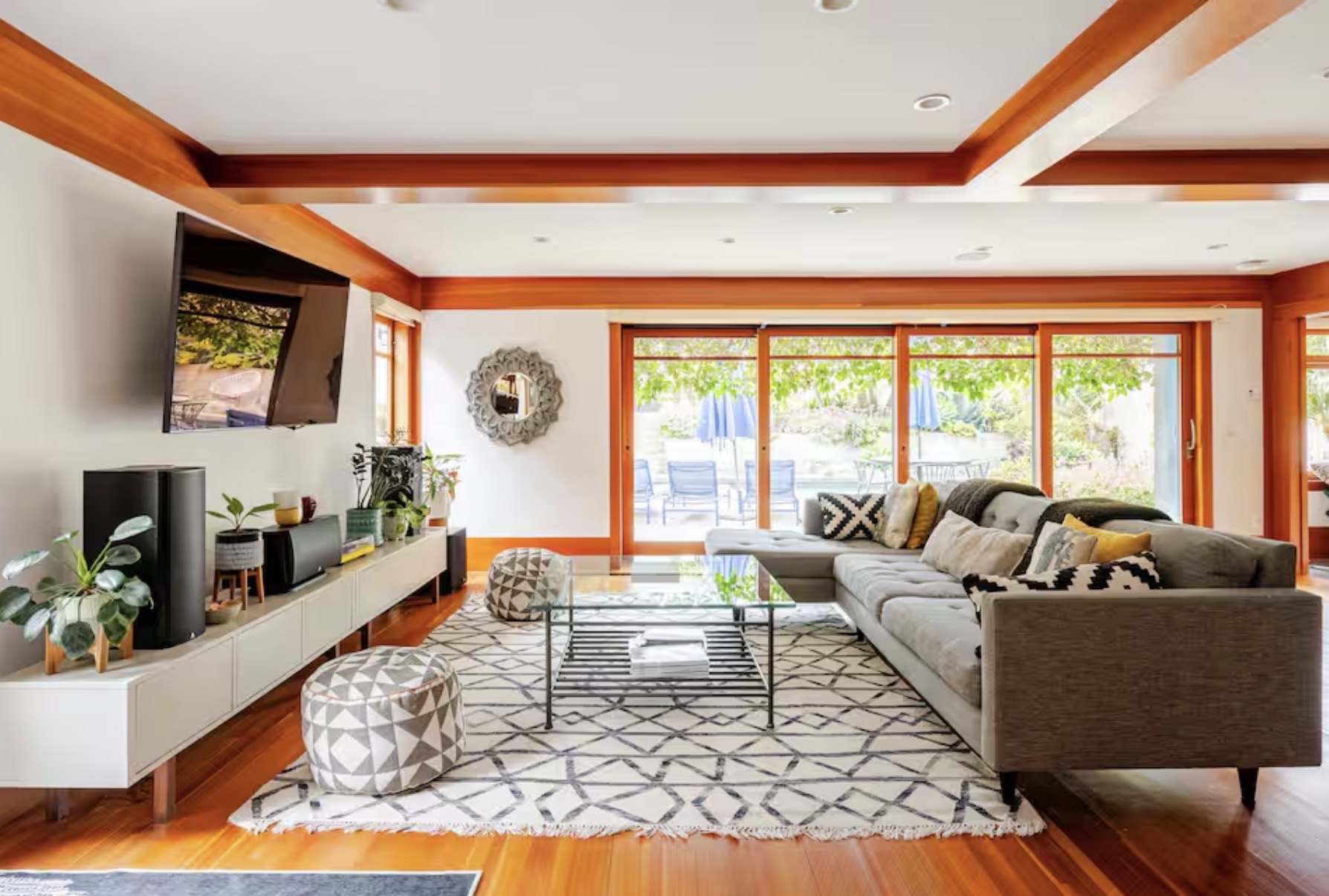 Luxury eclectic living room in a historic Irving Gill remodel