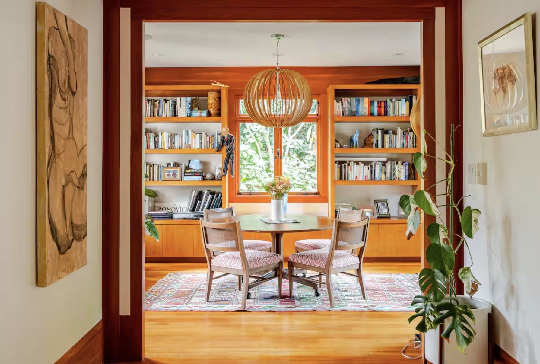 Library and breakfast room with custom shelves